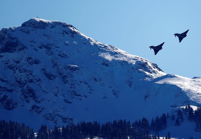 FILE PHOTO: Two Eurofighter Typhoon aircraft fly over the Streif course in Kitzbuehel