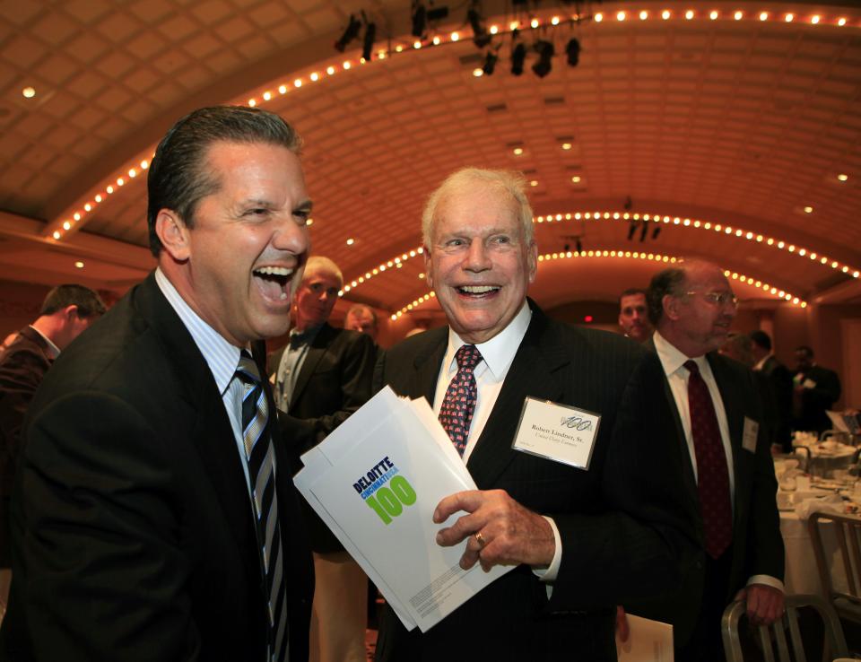 University of Kentucky basketball coach John Calipari, left, congratulates Robert D. Lindner Sr., in October 2010 for winning the Carl H. Lindner Award for Entrepreneurial and Civic Spirit. The award, named for Robert's brother, is given to a current or former leader of a company on the Deloitte Cincinnati 100 list of the largest privately held companies headquartered in the Cincinnati region.