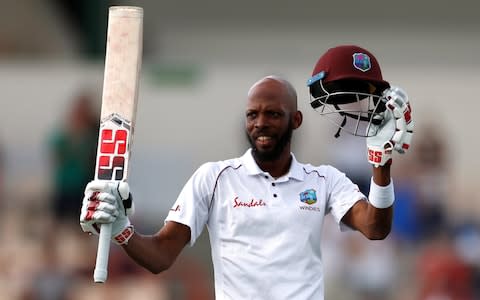 Roston Chase raises a battling century - Credit: Action Images via Reuters/Paul Childs