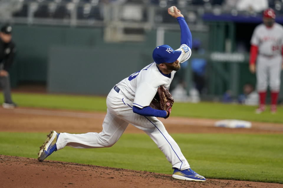 Kansas City Royals starting pitcher Danny Duffy delivers to a Los Angeles Angels batter during the third inning of a baseball game at Kauffman Stadium in Kansas City, Mo., Tuesday, April 13, 2021. (AP Photo/Orlin Wagner)