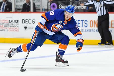 FILE PHOTO: Nov 5, 2018; Brooklyn, NY, USA; New York Islanders center Anthony Beauvillier (18) accepts a pass across the blue against the Montreal Canadiens during the second period at Barclays Center. Dennis Schneidler-USA TODAY Sports