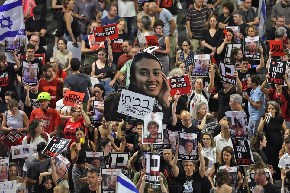 Relatives and supporters of Israeli hostages call for their release in Tel Aviv on June 8, 2024. (Jack Guez / AFP - Getty Images)