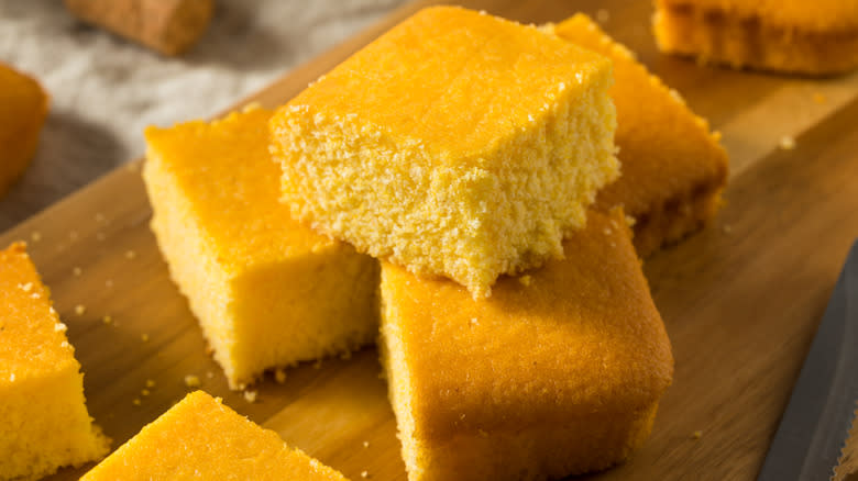 Square of cornbread on board