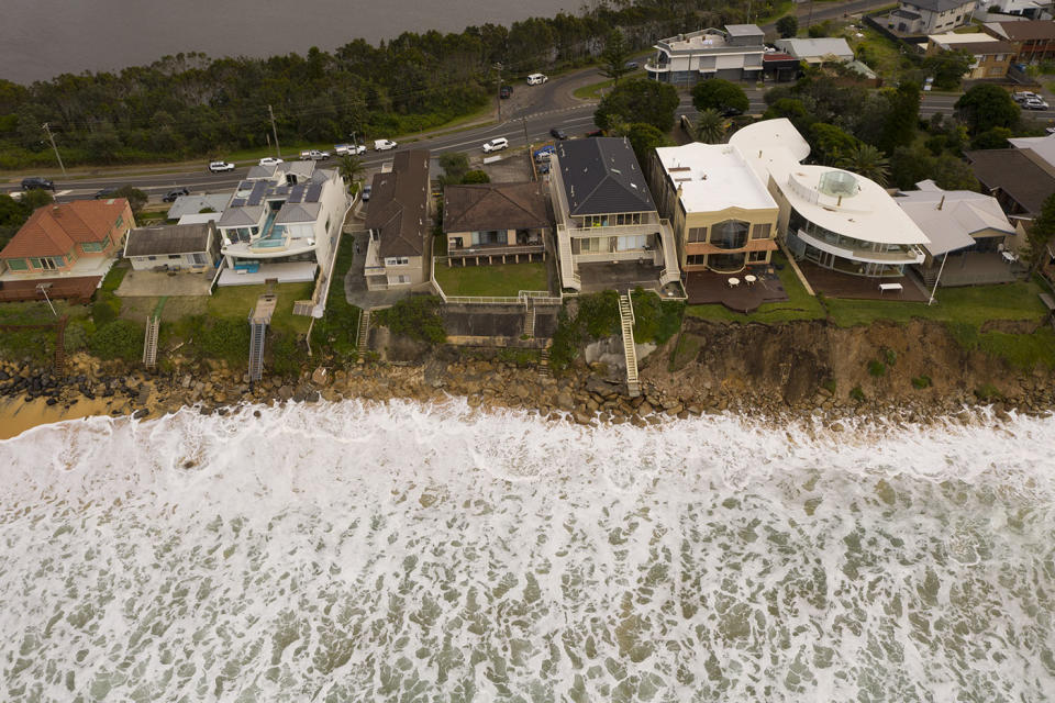 Nine coastal Wamberal properties pictured in 2020 amid a damaging storm.