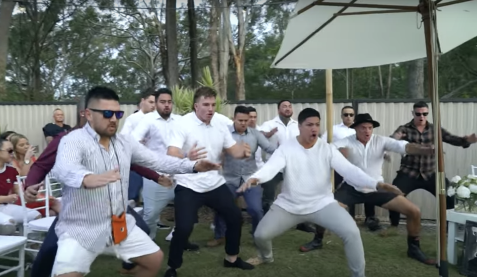 A group of men perform a haka at the wedding in Queensland. 