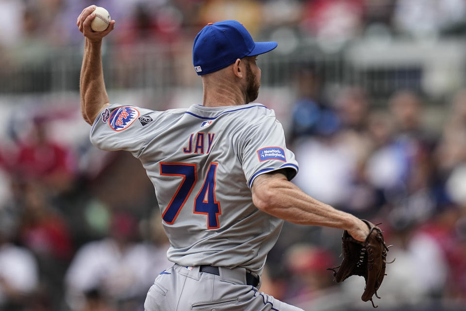 New York Mets pitcher Tyler Jay (74) delivers during the nineth inning inning of a baseball game against the Atlanta Braves, Thursday, April 11, 2024, in Atlanta. (AP Photo/Mike Stewart)