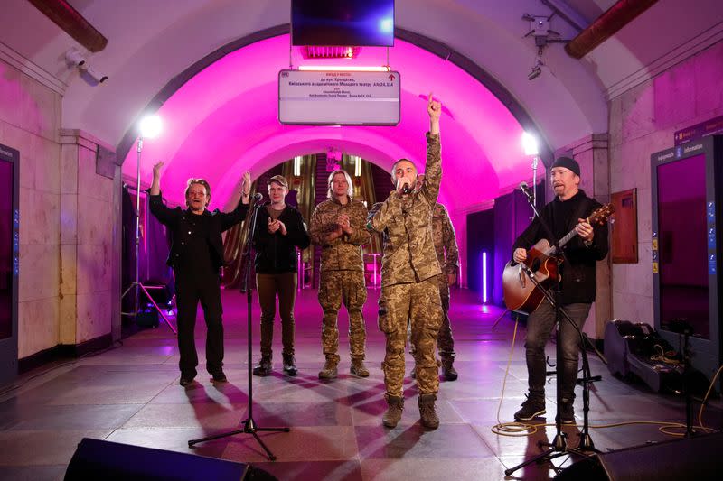 Bono, The Edge and Topolia sings during a performance for Ukrainian people inside a subway station in Kyiv