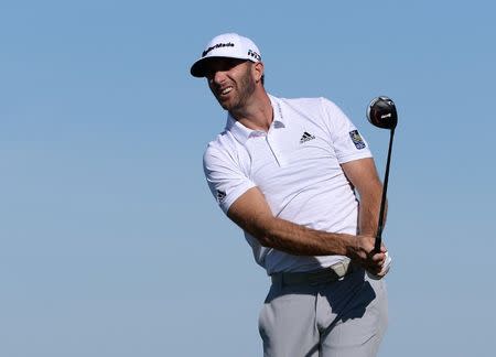 Feb 9, 2018; Pebble Beach, CA, USA; Dustin Johnson watches his shot from the 13th tee box during the second round of the AT&T Pebble Beach Pro-Am golf tournament at Monterey Peninsula Country Club - Shore Cours. Mandatory Credit: Orlando Ramirez-USA TODAY Sports