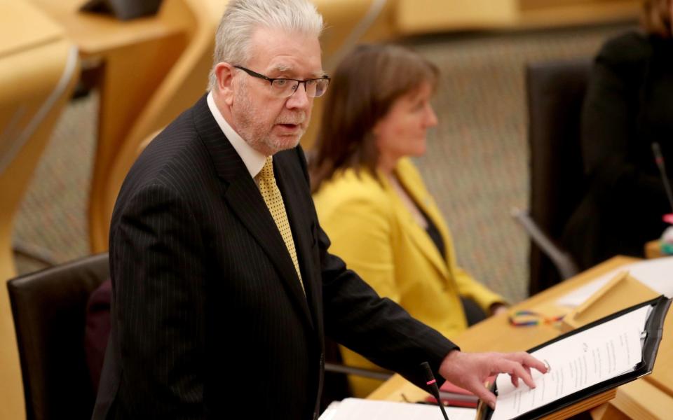 Mike Russell, the SNP cabinet secretary, admitted advice on face coverings was also being ignored - Jane Barlow/PA