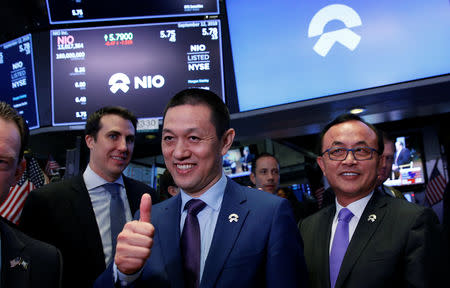 Bin Li, CEO of Chinese electric vehicle start-up NIO Inc., celebrates after ringing a bell as NIO stock begins trading on the floor of the New York Stock Exchange (NYSE) during the company’s initial public offering (IPO) at the NYSE in New York, U.S., September 12, 2018. REUTERS/Brendan McDermid