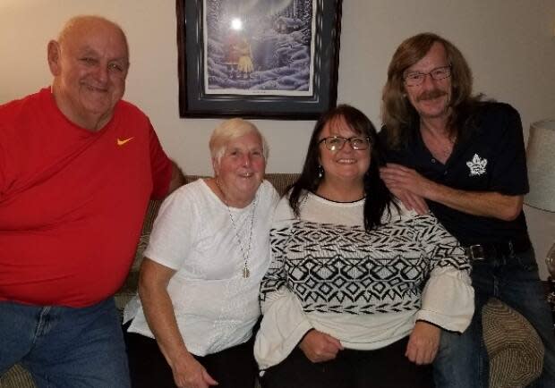 Tony Fowlow with his niece Mandy White and family. White organized a fundraiser for him after his stroke.