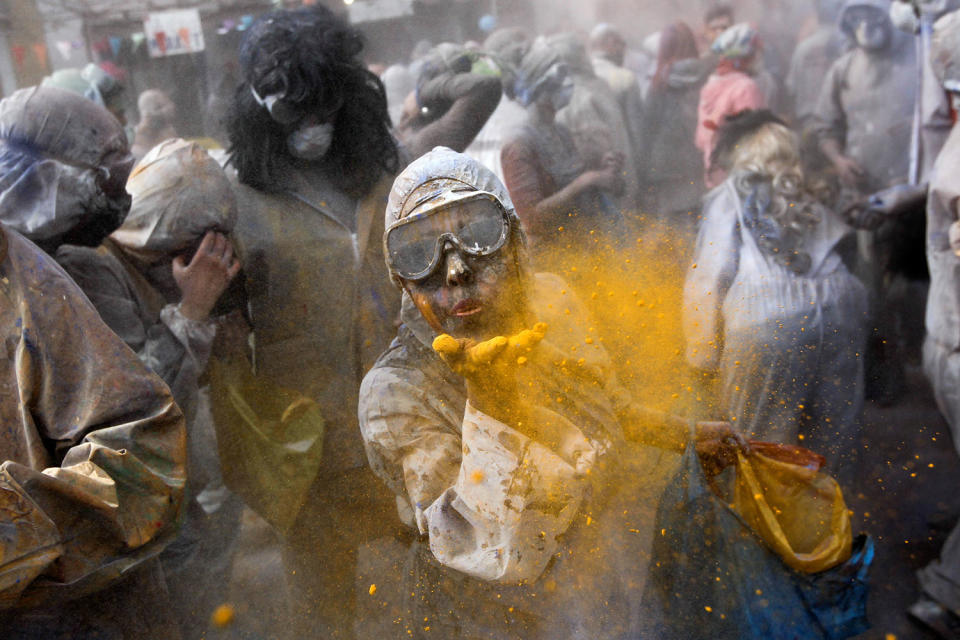 <p>Revelers throw colored flour at each other to celebrate Clean Monday, also known as Ash Monday, in the port town of Galaxidi, Greece, Feb. 27, 2017. Clean Monday is a traditional festivity marking the end of the carnival season and the start of the 40-day Lent period until the Orthodox Easter. (Photo: Alkis Konstantinidis/Reuters) </p>