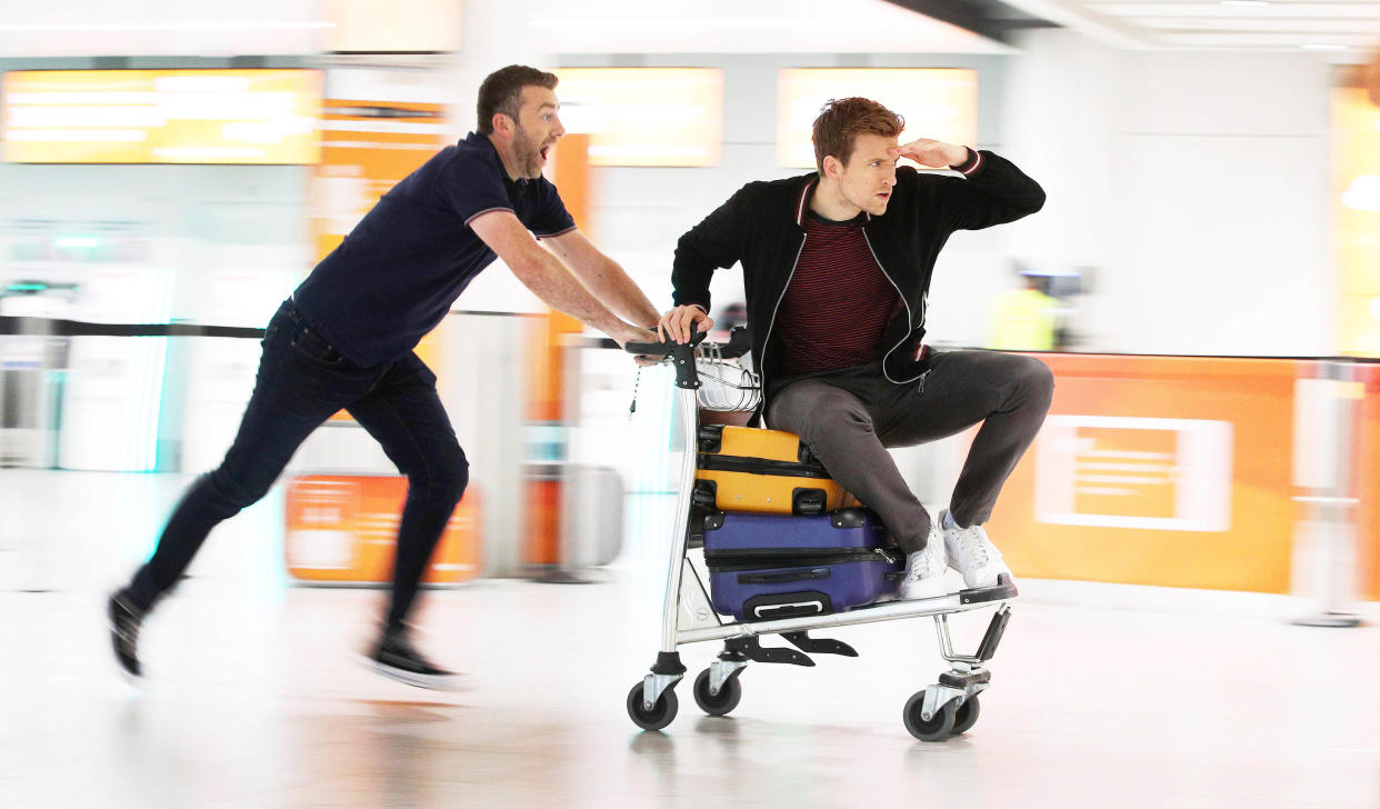 Greg James and Chris Smith, authors of Kid Normal, help easyJet launch 300 “Flybraries” (flying libraries) at Gatwick Airport.