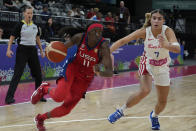 United States' Kahleah Copper tries to get the ball past Puerto Rico's Zaida Gonzalez at the women's Basketball World Cup in Sydney, Australia, Friday, Sept. 23, 2022. (AP Photo/Mark Baker)
