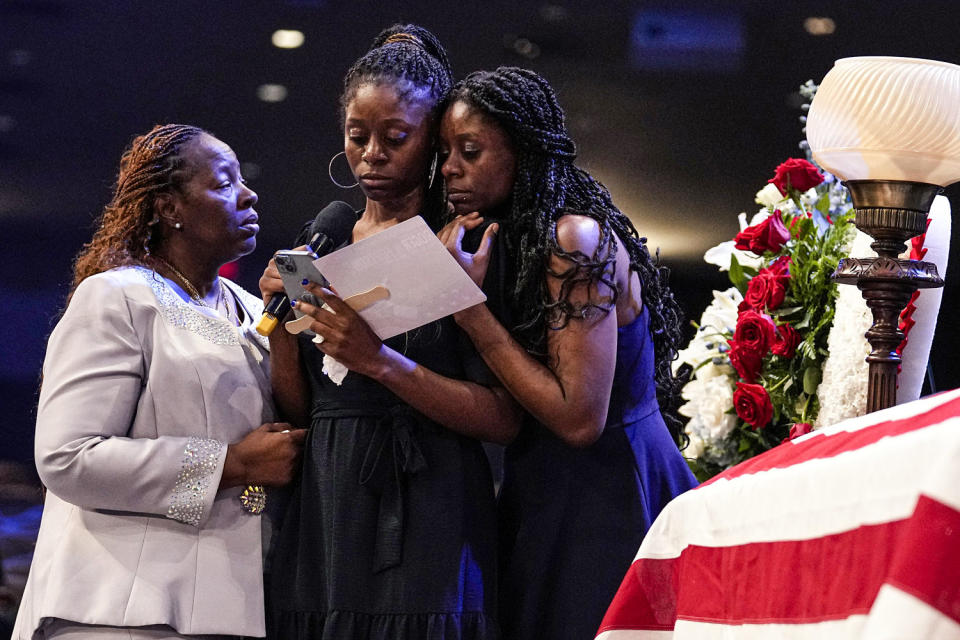 Chantemekki Fortson, mother of Roger Fortson with family members. (Brynn Anderson / AP)