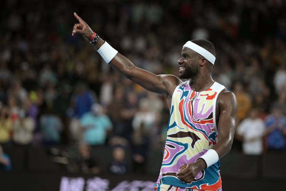 Frances Tiafoe of the U.S. celebrates after defeating Shang Juncheng of China in their second round match at the Australian Open tennis championship in Melbourne, Australia, Wednesday, Jan. 18, 2023. (AP Photo/Aaron Favila)