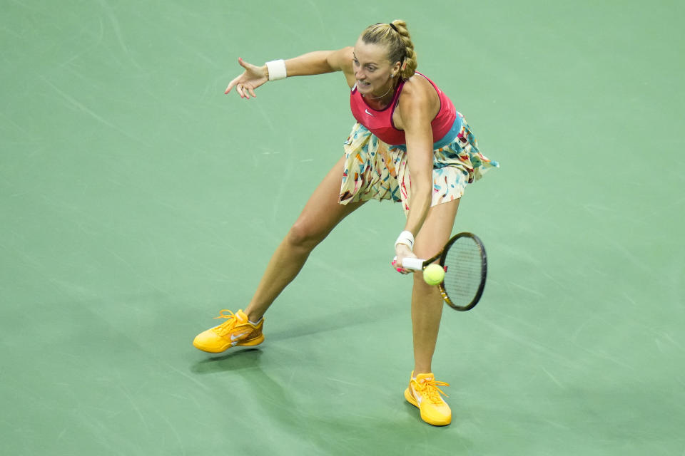 Petra Kvitova, of the Czech Republic, returns a shot to Caroline Wozniacki, of Denmark, during the second round of the U.S. Open tennis championships, Wednesday, Aug. 30, 2023, in New York. (AP Photo/Frank Franklin II)