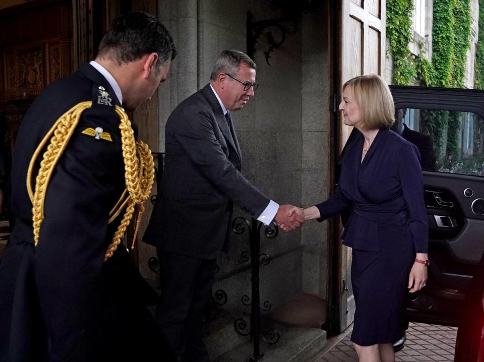 Liz Truss is greeted by the Queen’s Equerry Lieutenant Colonel Tom White and her Private Secretary Sir Edward Young at Balmoral (Andrew Milligan/PA) (PA Wire)