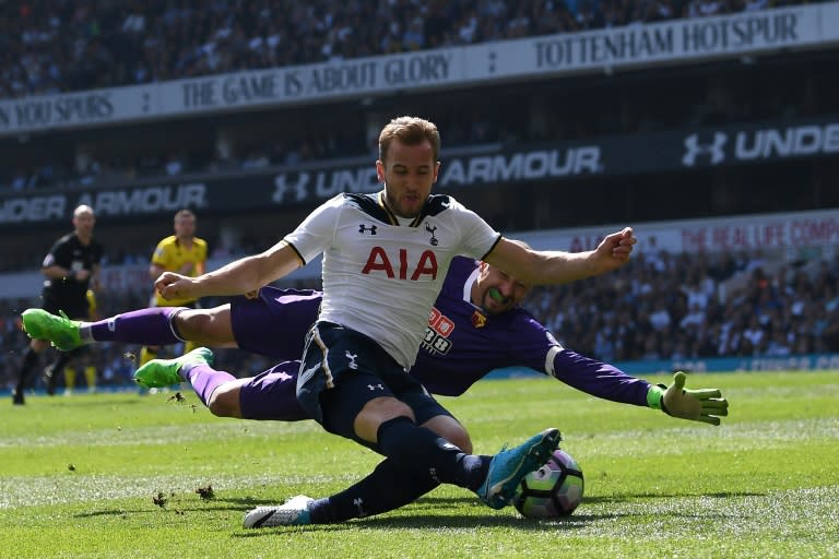 Tottenham Hotspur's Harry Kane shoots past Watford's goalkeeper Heurelho Gomes but fails to score during their English Premier League match, at White Hart Lane in London, on April 8, 2017