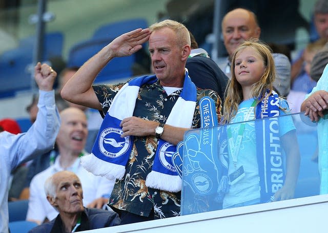 Norman Cook aka Fatboy Slim in the stands at the AMEX Stadium