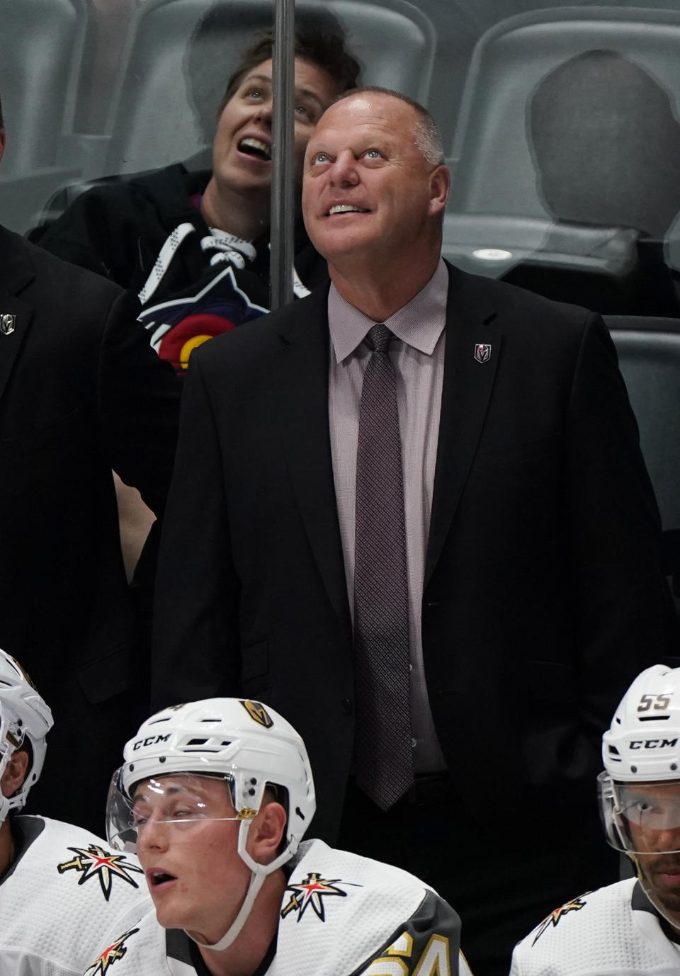 Vegas Golden Knights coach Gerard Gallant smiles during the third period of the team's preseason NHL hockey game against the Colorado Avalanche, Tuesday, Sept. 17, 2019, in Denver. (AP Photo/Jack Dempsey)