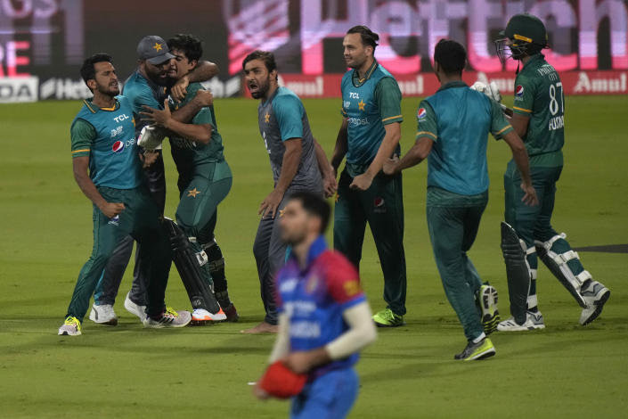 Pakistan's Naseem Shah, third left, and teammates celebrate their win in the T20 cricket match of Asia Cup against Afghanistan, in Sharjah, United Arab Emirates, Wednesday, Sept. 7, 2022. (AP Photo/Anjum Naveed)
