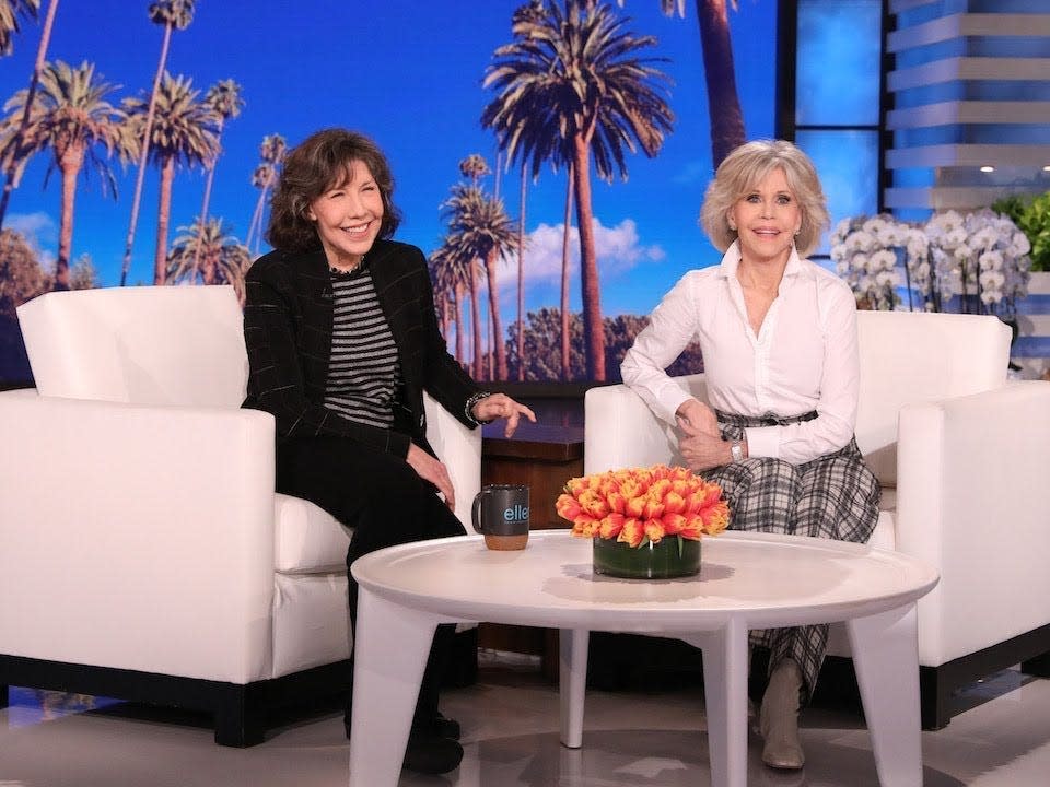 Lily and Jane sitting and smiling in DeGeneres' studio.