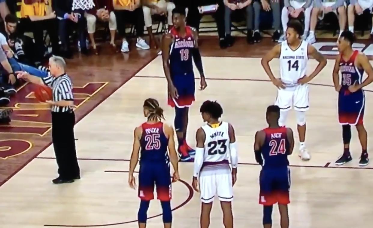 An Arizona cheerleader was ejected Thursday at Arizona State. (Screenshot via WatchESPN)