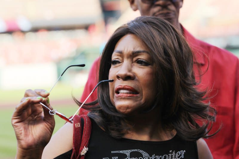 Singer Mary Wilson of the Supremes stands on the field before the Colorado Rockies-St. Louis Cardinals baseball game at Busch Stadium in St. Louis on July 24. On October 22, 1966, The Supremes became the first all-female group to score a No. 1 album, with "Supremes a Go-Go." File Photo by Bill Greenblatt/UPI