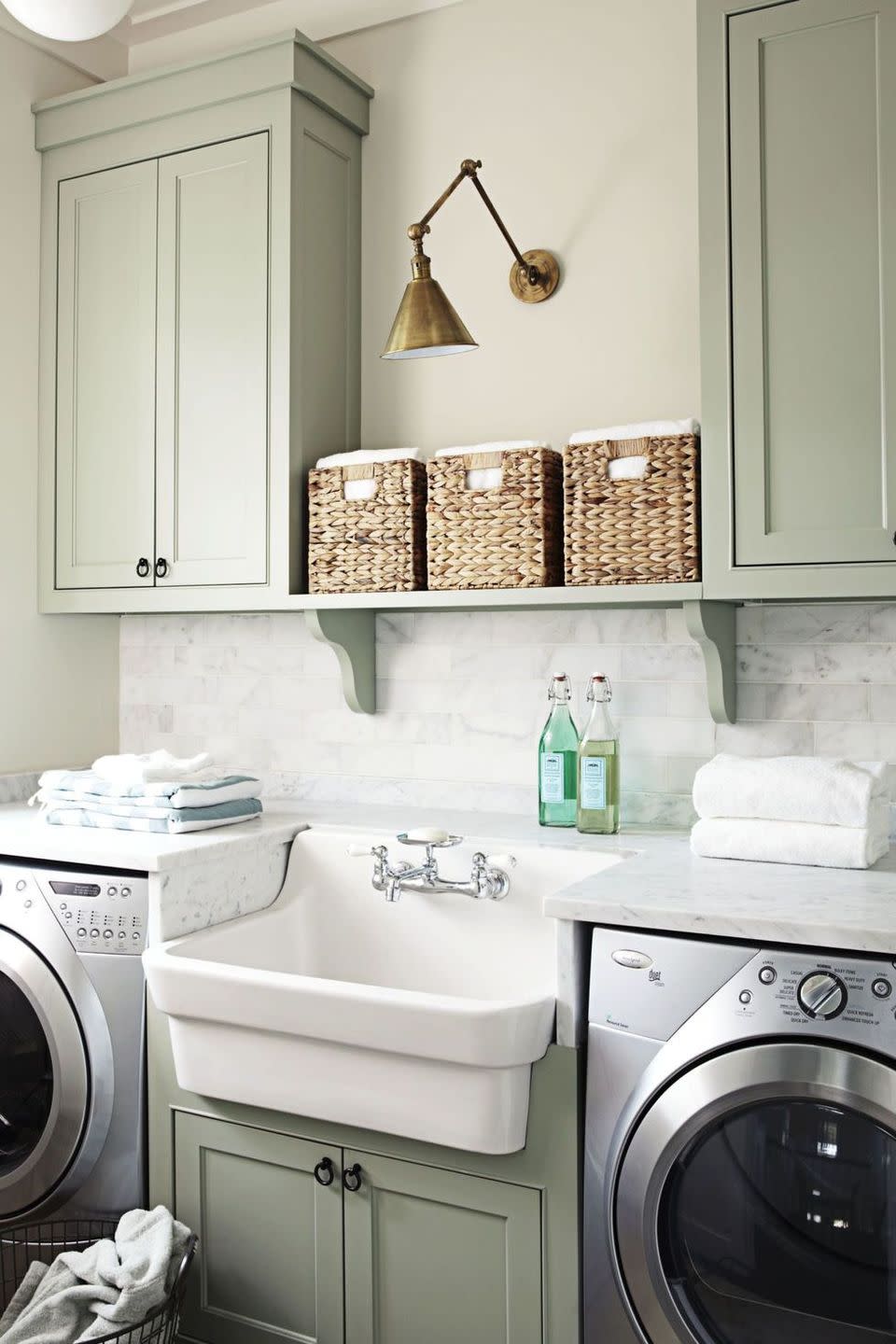 a kitchen with white cabinets