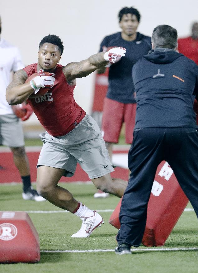 Running back Joe Mixon runs a drill at Oklahoma's Pro Day, Wednesday, March 8, 2017, in Norman, Okla. The event is to showcase players for the upcoming NFL football draft. (AP Photo/Alonzo Adams)