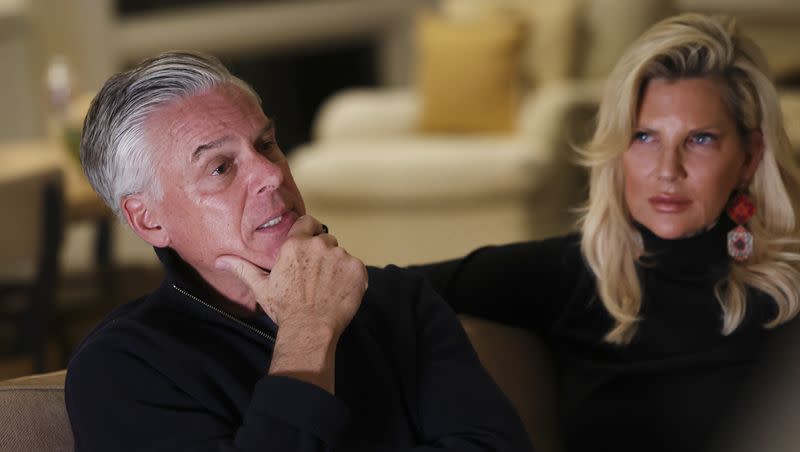 Jon Huntsman Jr. and his wife Mary Kaye watch the GOP presidential debate at their Salt Lake City home on Wednesday, Nov. 8, 2023.