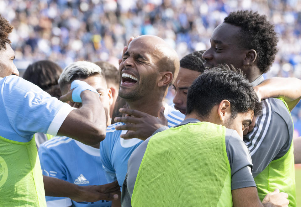 NYFC forward Héber (9) celebrates his goal against CF Montreal with teammates during the first half of an MLS Eastern Conference semifinals soccer game in Montreal, Sunday, Oct. 23, 2022. (Paul Chiasson/The Canadian Press via AP)