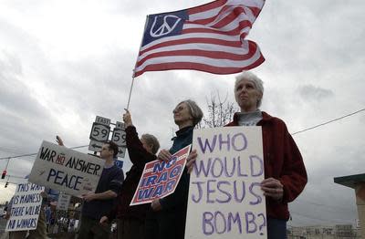 From left, Matthew Kirists of Nyack, Jim Uleman of Pearl River, Margery Cleveland of Ramsey, N.J. and her sister Marilyn Cleveland of Pearl River protest against the Iraq War on Middletown Road in Nanuet on Saturday, March 29, 2003.