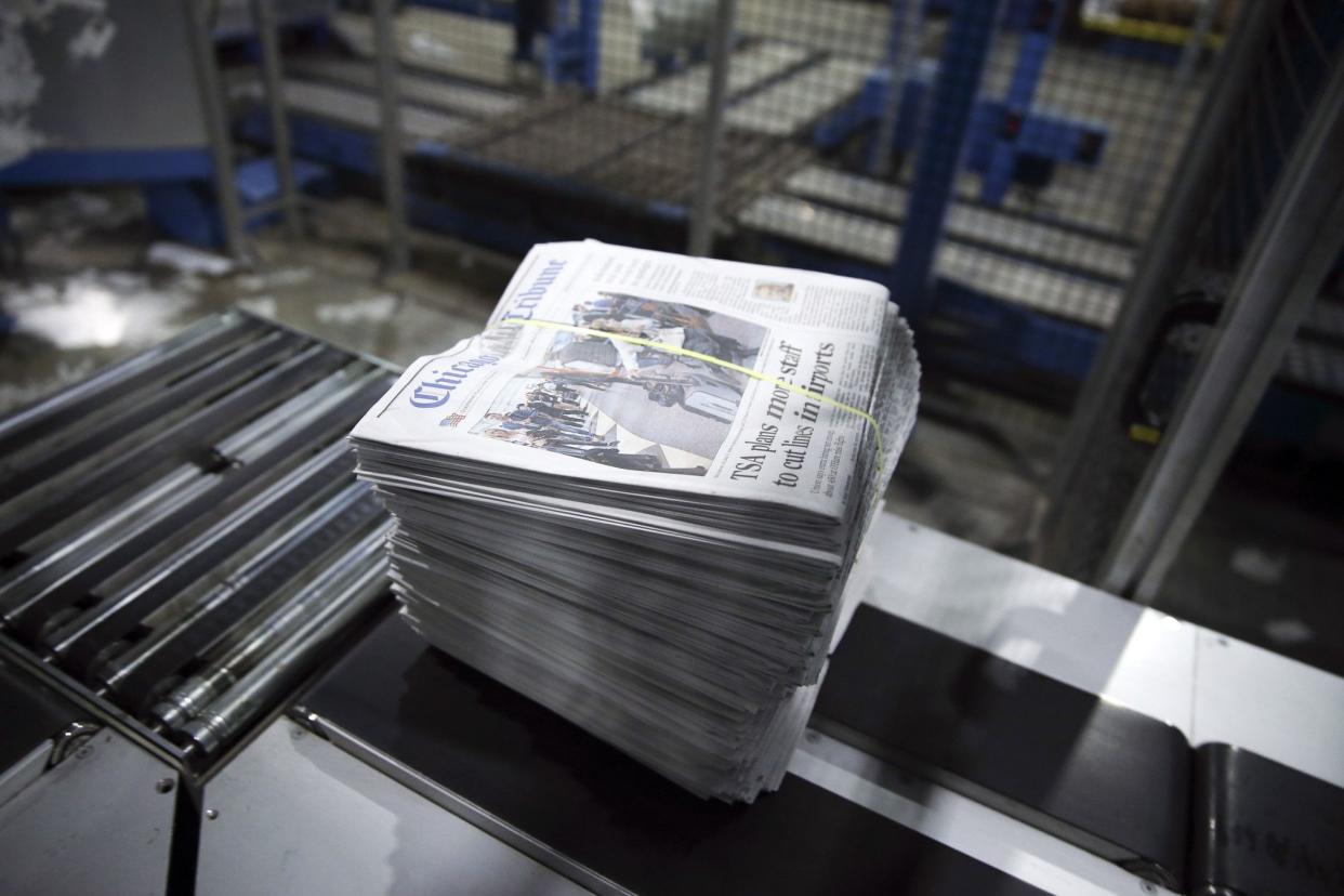 Bundles of Chicago Tribune newspaper come off the press at the Chicago Tribune Freedom Center, 560 W. Grand Ave., in Chicago on Monday, May 16, 2016.