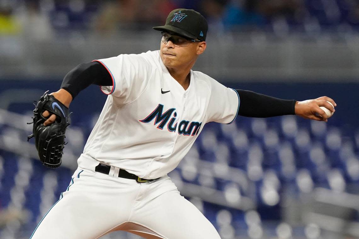 Miami Marlins starting pitcher Jesus Luzardo aims a pitch during the first inning of a baseball game against the Tampa Bay Rays, Tuesday, Aug. 30, 2022, in Miami.