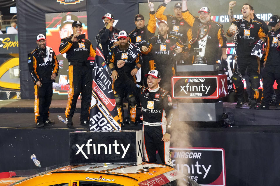 Daniel Hemric celebrates after winning the NASCAR Xfinity Series auto race Saturday, Nov. 6, 2021, in Avondale, Ariz. Hemric won the season title. (AP Photo/Rick Scuteri)