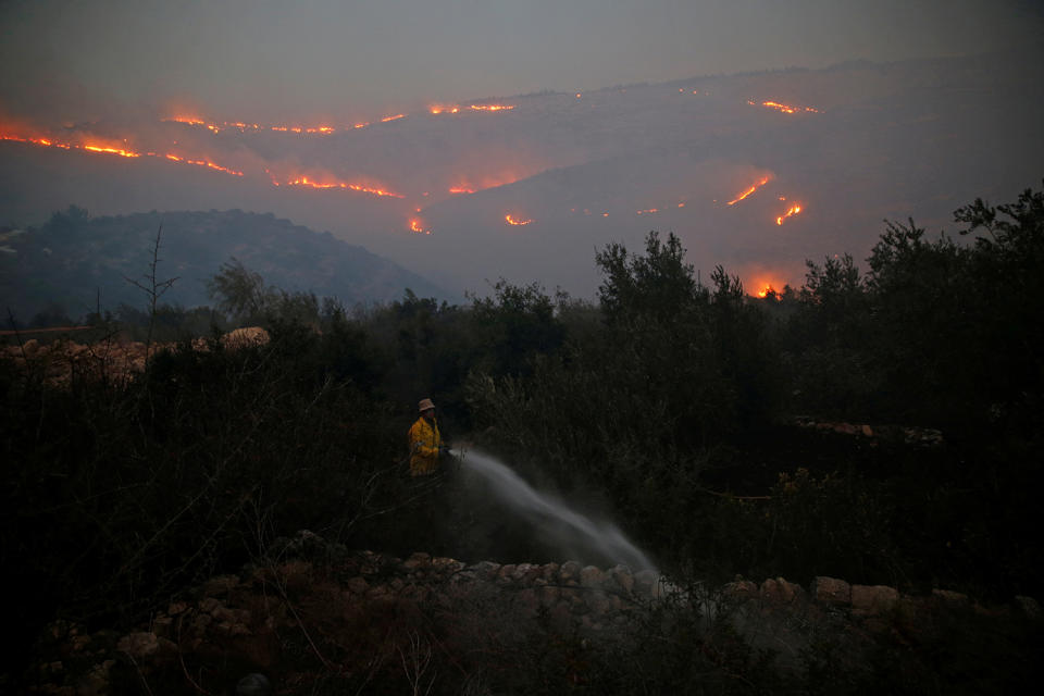 Massive wildfires tear across Israel