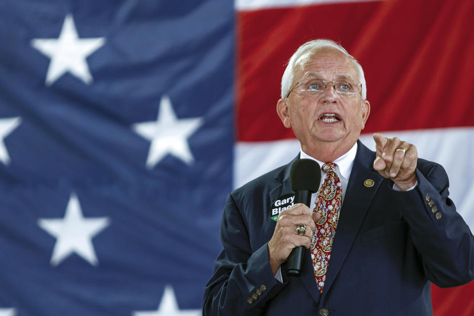 FILE - In this Aug. 7, 2021, file photo Georgia Agriculture Commissioner and candidate in Georgia's upcoming U.S. Senate race Gary Black makes a speech during the 17th annual Floyd County GOP Rally at the Coosa Valley Fairgrounds in Rome, Ga. “We’re in this race to win it, we’re Georgia’s candidate (not the Swamp’s),” Georgia Agriculture Gary Black, who compared his campaign to the Atlanta Braves' unexpected World Series run. “ Our mindset today is the same as the #Braves: Kill the narrative.” (Troy Stolt/Chattanooga Times Free Press via AP, File)