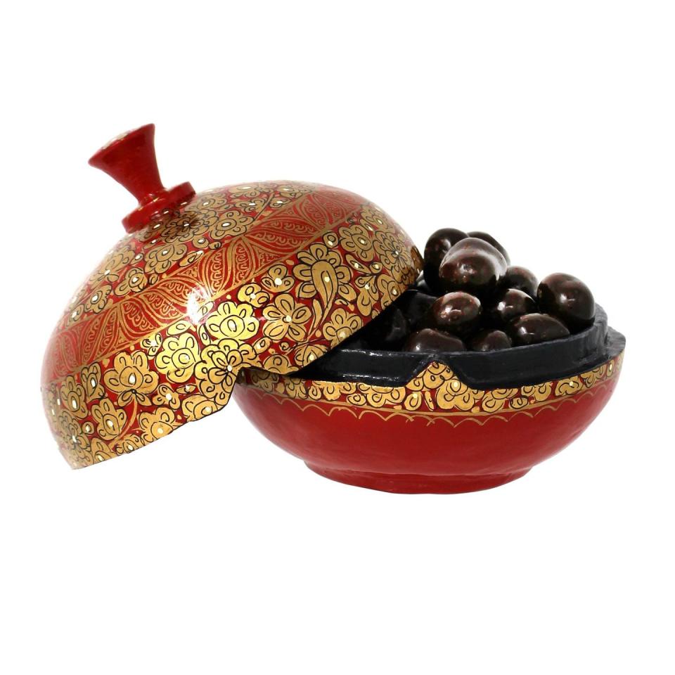 <p><a class="link " href="https://www.farhi.co.uk/collections/best-sellers/products/dark-chocolate-coated-coffee-beans-in-a-hand-made-papier-mache-bonbonniere" rel="nofollow noopener" target="_blank" data-ylk="slk:SHOP NOW;elm:context_link;itc:0;sec:content-canvas">SHOP NOW</a></p><p>Caffeine addicts will adore these aromatic chocolate-covered beans, exquisitely presented in a handmade papier-mâché bonbonnière.</p><p>Chocolate-coated coffee beans in a bonbonnière, from £15, Rita Farhi</p>