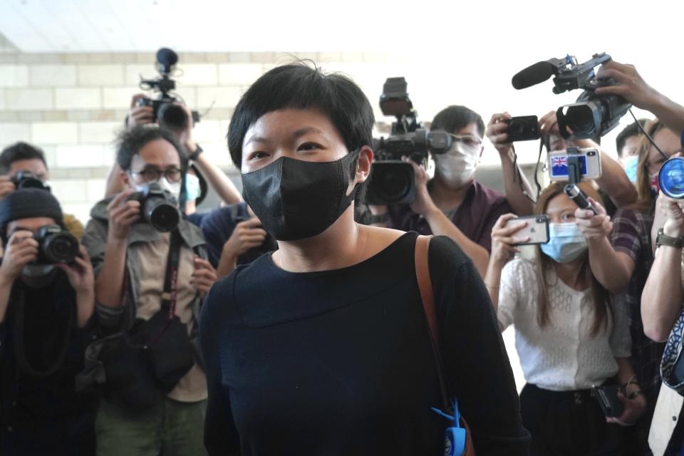 Hong Kong journalist Choy Yuk-ling, also known as Bao Choy, arrives a court in Hong Kong Thursday, April 22, 2021. Choy appeared in court on Thursday for verdict on charges of making false statements while obtaining information from a vehicle database. Choy, a producer at public broadcaster Radio Television Hong Kong, was arrested in Nov 2020. She was involved in the production of an investigative documentary into the behavior of Hong Kong police during 2019 anti-government protests, after the force was accused of not intervening during a violent clash between protesters and a mob of men in a subway station. (AP Photo/Kin Cheung)