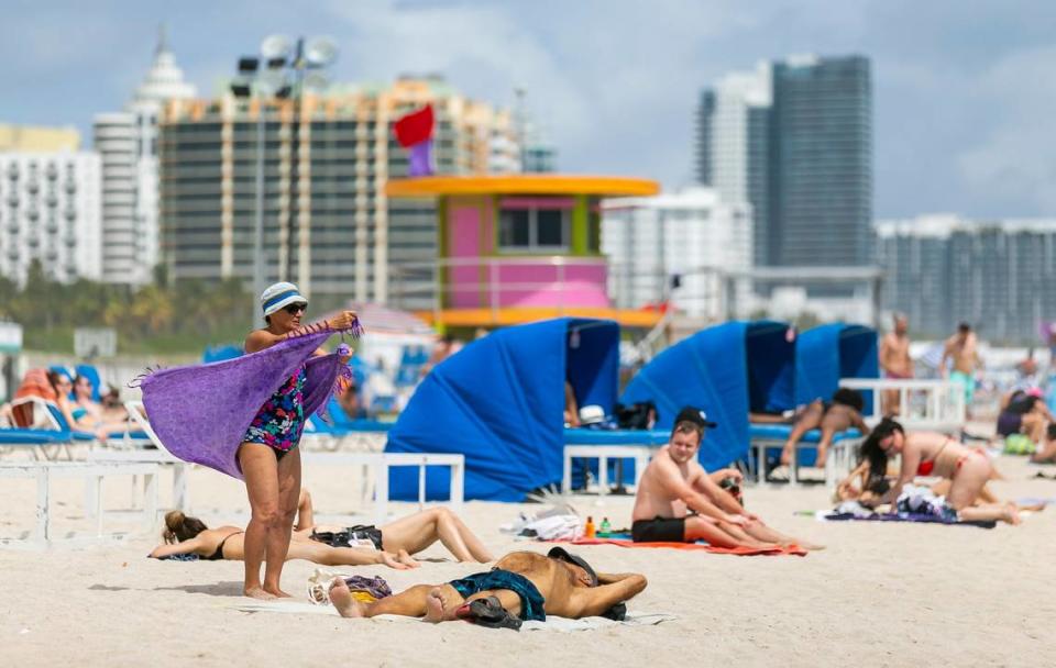 People visit Miami Beach, Florida on Wednesday, March 23, 2022.