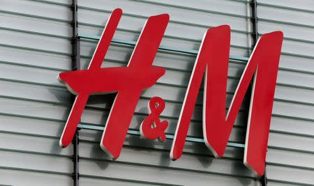 FILE PICTURE: The logo of Swedish fashion retail group H&M is seen at a building in Dietlikon, Switzerland October 11, 2016. REUTERS/Arnd Wiegmann