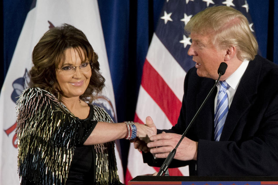 FILE - Former Alaska Gov. Sarah Palin, left, appears with then-Republican presidential candidate Donald Trump at a rally at the Iowa State University on Jan. 19, 2016, in Ames, Iowa. Former Alaska Gov. Sarah Palin has picked up a prized endorsement in her bid in an extremely crowded field to fill the unexpired term of the late U.S. Rep. Don Young. Former President Donald Trump backed Palin on Sunday, April 3, 2022, in a statement from his political action committee. (AP Photo/Mary Altaffer, File)