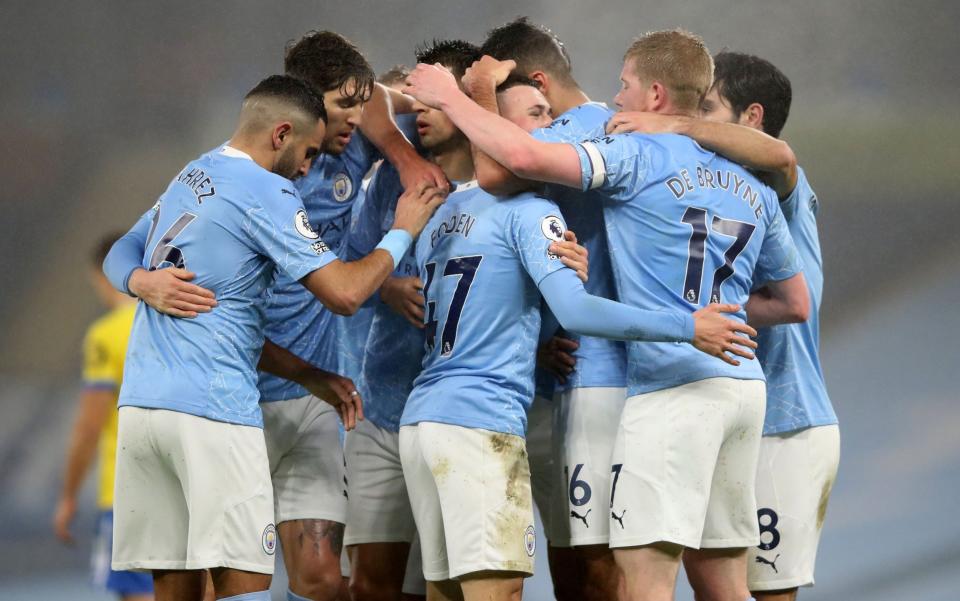 Man City players celebrate. - GETTY IMAGES