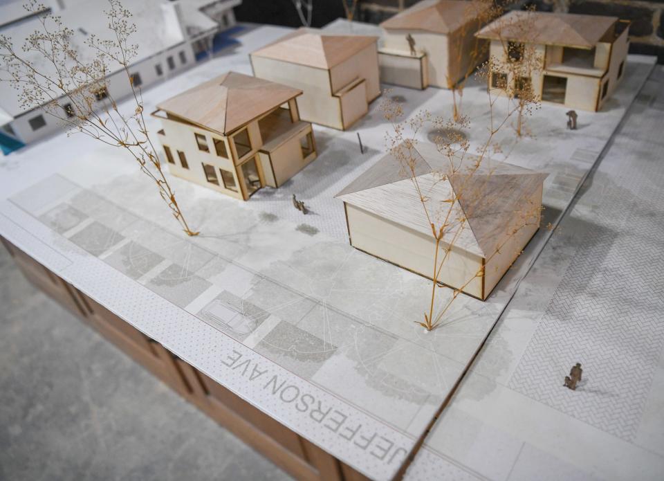 Intricate renderings are seen at an open house for the exhibition of University of Tennessee students' research showcasing the design concept for the mayor's proposed Missing Middle Housing ordinance changes in Knoxville, Friday, Dec. 1, 2023.