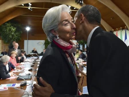IMF Managing Director Christine Lagarde greets U.S. President Barack Obama at the second working session of a G7 summit at the Elmau castle in Kruen near Garmisch-Partenkirchen, Germany, June 8, 2015. REUTERS/John Macdougall/Pool