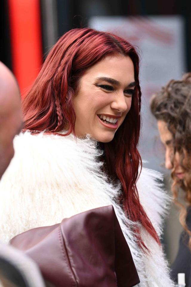 Dua Lipa Matched Her Hair to Her Bag and Her Boots - Yahoo Sports