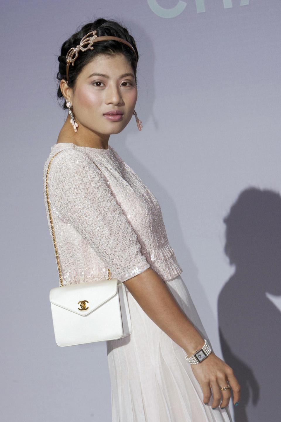 Thailand's Princess Siriwanwaree Nareerat attends Chanel fashion house presentation for Women's Fall-Winter, ready-to-wear 2013 fashion collection, during Paris Fashion week, Tuesday, March 6, 2012. (AP Photo/Thibault Camus)