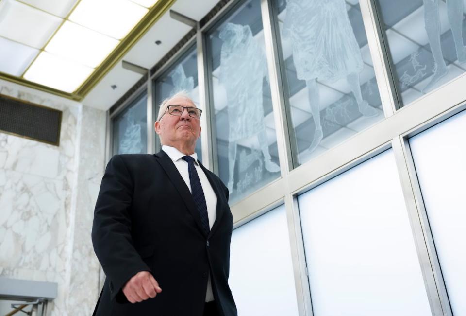 Defence Minister Bill Blair arrives to appear as a witness during the Public Inquiry Into Foreign Interference in Federal Electoral Processes and Democratic Institutions in Ottawa on Wednesday, April 10, 2024.